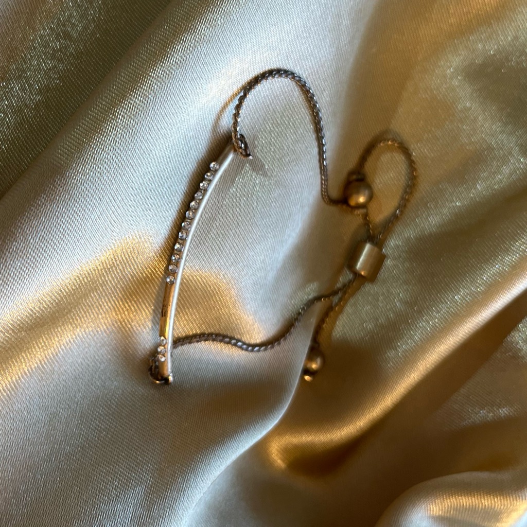 Goldtone Sliding Clasp Bracelet With Curved Bar  Rhinestone Deco